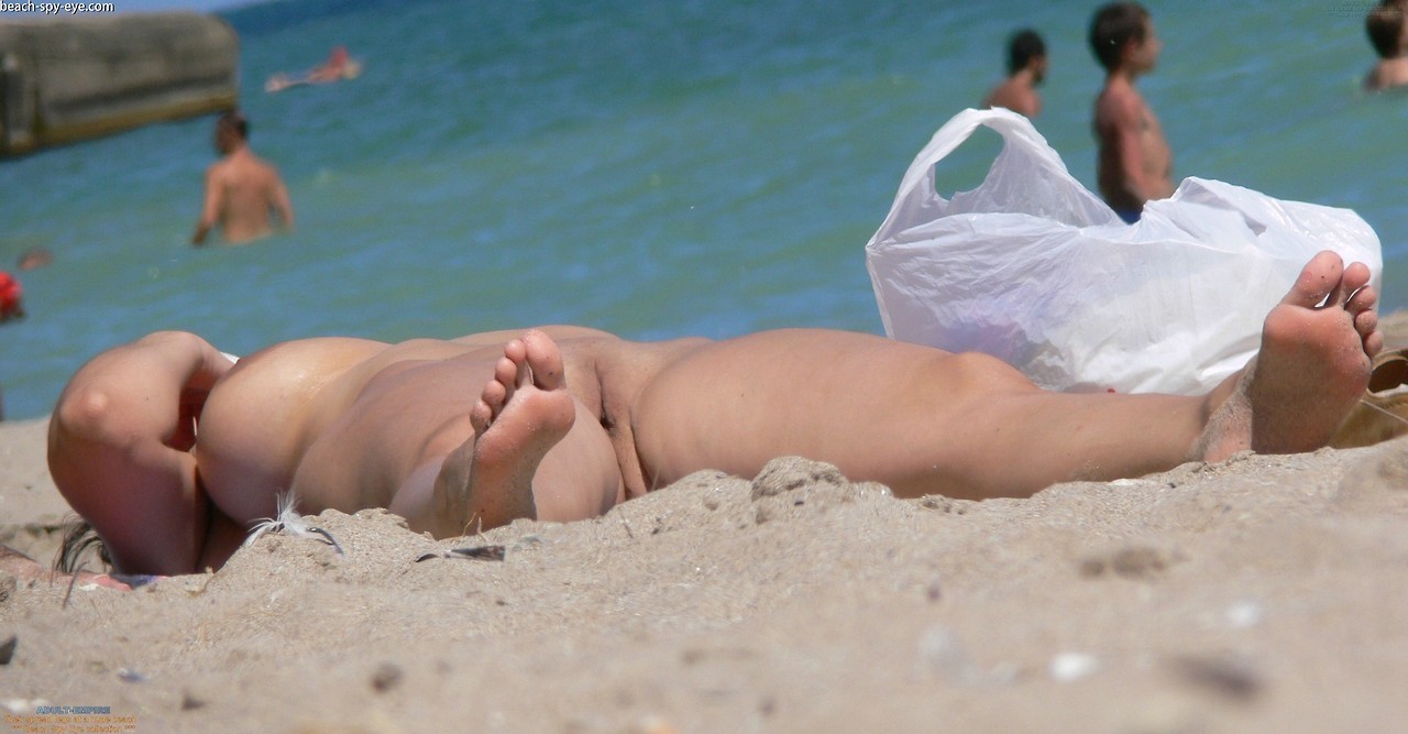 nude women on beach ; nudist body tan-lines, spreading legs female and nudist women nude beach women, beach spy photos..