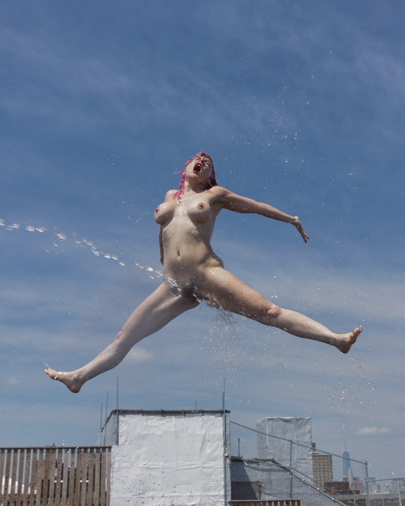 Nude woman’s jump